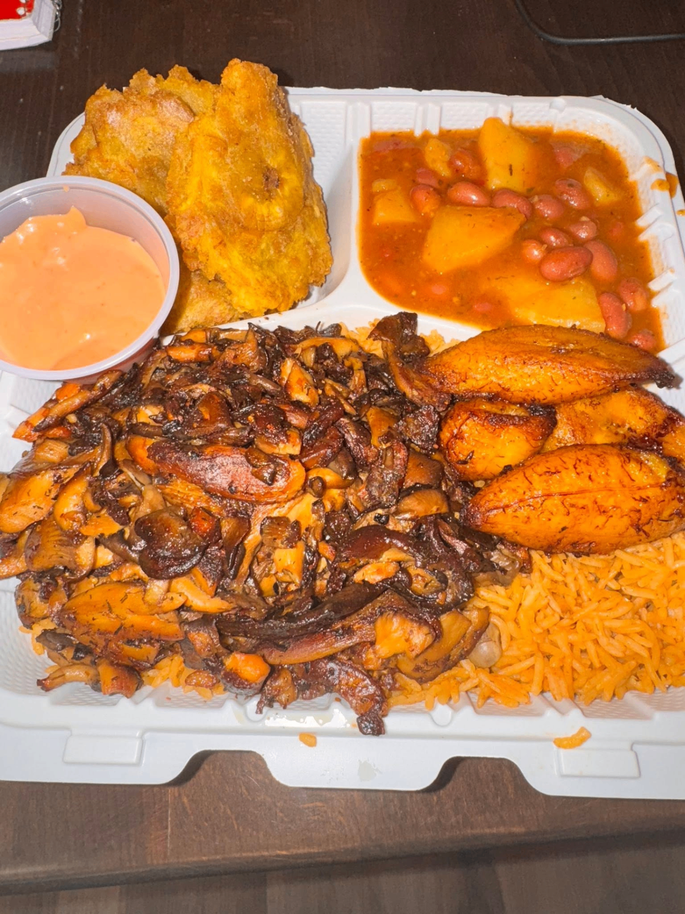 Flamin' chicken with rice, plantains and beans