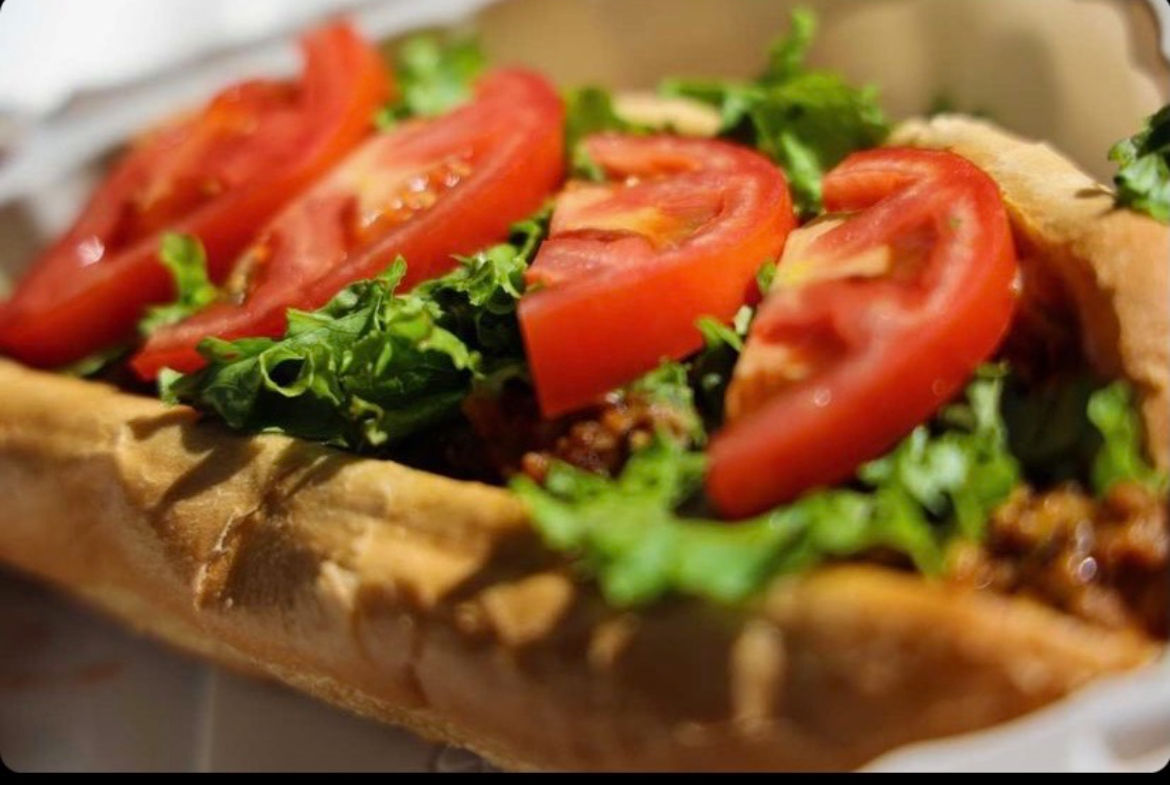Vegan sub loaded with fresh tomato and lettuce